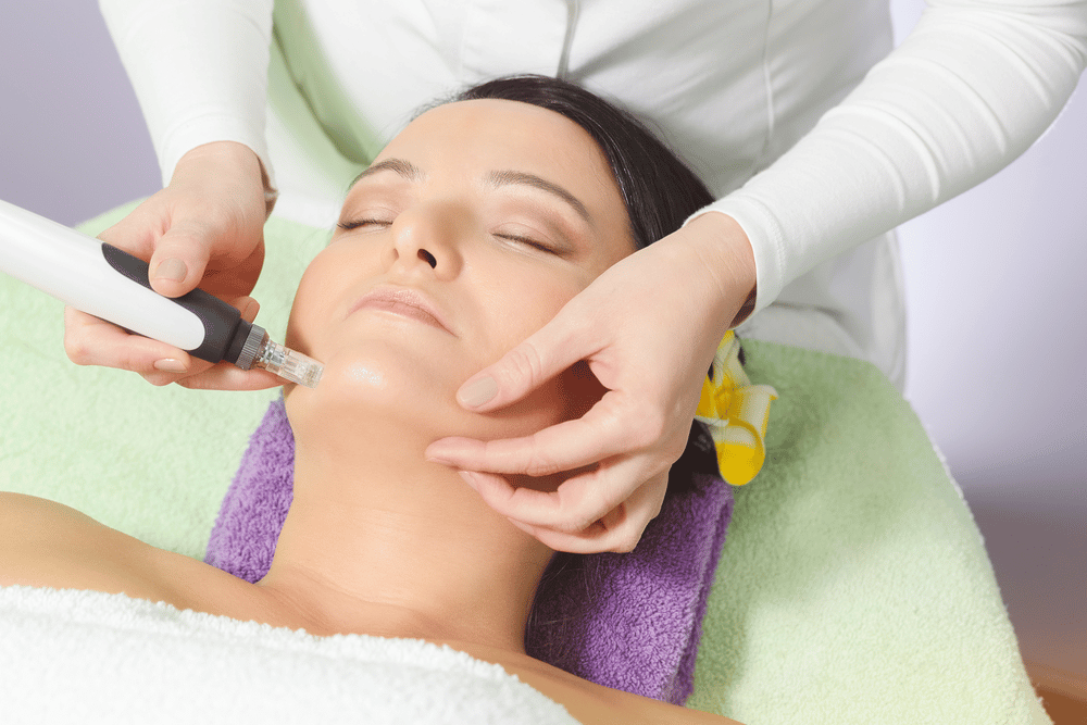 Female undergoing skin care treatment